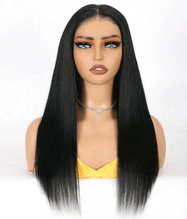 Mannequin head with long black straight wig on a white background