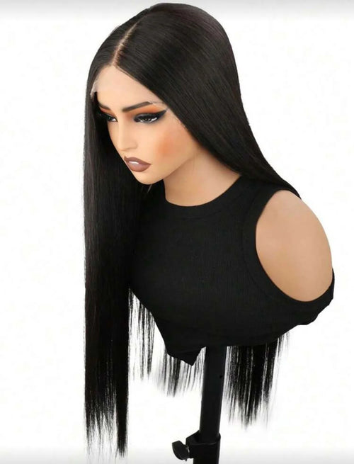 Mannequin head with long black hair on a white background